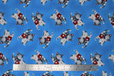Flat swatch comfort kitties fabric (bright medium blue fabric with tossed cartoon grey and white snuggly kitties with red first aid kits)