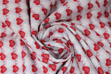Swirled swatch heartbeat fabric (grey fabric with alternating stripes of red hearts with red/white beat lines, and faint white hearts with beat lines)