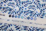Raw hem swatch blue floral printed fabric in blue leaves on white