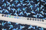 Raw hem swatch blue floral printed fabric in hummingbirds (light blue tiny hummingbirds tiled on dark blue)