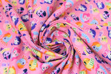 Swirled swatch pony toss fabric (bubblegum pink fabric with small tossed cartoon pony heads with text beneath "Oh, hi!" "Lit!" "Slay" etc.)