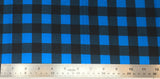 Flat swatch buffalo plaid fabric in blue/black