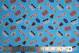 Flat swatch mike sticker fabric (bright blue fabric with tossed mike related office emblembs in full colour cartoon style tossed allover: mugs, awards, name tags, etc.)
