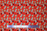 Flat swatch Outatime fabric (red fabric with tossed clocks and timers allover with license plates that read 'outatime')