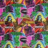 Square swatch Halloween Monster Pop Collage fabric (brightly coloured stickers look fabric with tossed illustrative monsters in full colour allover 'dracula, the mummy' etc with white outlines and text in various colours)