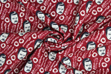 Swirled swatch Ron Bacon & Eggs fabric (dark red fabric with tossed white bacon and eggs and tossed black/white character heads)