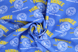 Swirled swatch Non Essential Badge fabric (blue fabric with 'Pawnee City Hall' text and circular badges with 'non-essential employee' text)