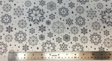 Flat swatch snowflake variety printed fabric in grey (tossed geometric look snowflakes in various sizes/styles in grey shades)