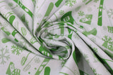Swirled swatch snow sports fabric in lime (white fabric with tossed snow sports emblems in lime green colour: skis, snowboards, goggles, hats, snowflakes, poles, boots)