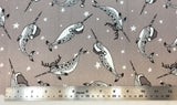 Flat swatch santa hat cartoon narwhals printed fabric in grey (grey fabric with tossed cartoon grey narwhals with santa hats and candy cane look tusk and tossed white stars all in grey and white colourway)