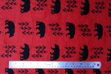 Flat swatch bearfoot fabric (red fabric with black bear silhouettes and small black tree outlines repeated)