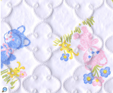 Furry pink and blue teddies and yellow bunnies printed on white quatrefoil-quilted vinyl