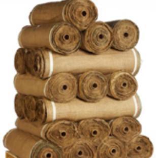 Stacks of rolled burlap