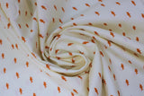 Swirled swatch Sharkies fabric (white fabric with scattered lines of tiny orange shark silhouettes)