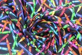 Swirled swatch crayons fabric (black fabric with tossed crayons in all colours of rainbow allover)