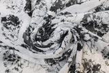 Swirled swatch White/Grey/Black fabric (white fabric with tossed/layered black and grey floral heads)