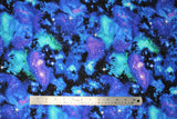Flat swatch galaxy fabric (black fabric with large blue, teal and purple galaxy shaped light forms with bright white stars)