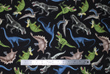 Flat swatch dino world coloured dinosaurs fabric (black fabric with tossed dinosaurs in full colour allover in green, blue, brown, and grey)