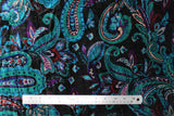 Flat swatch Paisley fabric (black fabric with large tossed paisley print allover in blue, teal, purple shades)