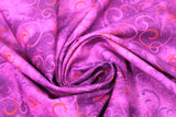 Swirled swatch swirly splendor fabric (fuchsia marbled look fabric with light and dark purple and red thin swirl patterns allover)