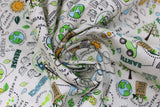 Swirled swatch go green fabric (white fabric with small tossed drawn look emblems allover related to recycling and earth day, etc. yellow suns, green recycling symbols, green cars, small planets, etc.)
