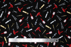 Square swatch Tossed Hair Tools fabric (black fabric with tossed drawn style hair tools in full colour: silver scissors, silver straighteners, silver round brushes, red brushes, red blow dryers, gold spray bottles, gold combs, gold scissors, etc.)