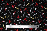 Flat swatch Tossed Hair Tools fabric (black fabric with tossed drawn style hair tools in full colour: silver scissors, silver straighteners, silver round brushes, red brushes, red blow dryers, gold spray bottles, gold combs, gold scissors, etc.)