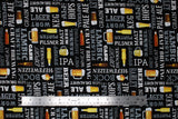 Flat swatch Grab Me A Beer fabric (black fabric with horizontal and vertical text allover in white with beer related words "Ale" "IPA" "Hops" etc. and assorted beer glasses, steins and bottles)