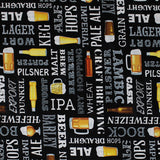 Square swatch Grab Me A Beer fabric (black fabric with horizontal and vertical text allover in white with beer related words "Ale" "IPA" "Hops" etc. and assorted beer glasses, steins and bottles)