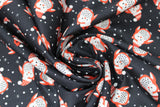 Swirled swatch snowy owls fabric (black fabric with small tossed cartoon owls in grey and red allover with red fabric santa hats on in various fabrics and tossed snowflakes)