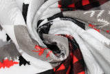 Swirled swatch cabin quilt red fabric (quilt squares look fabric with cabin themed squares, moose, pinecones, bears, trees etc. in white, grey, black and red colourway)