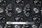 Flat swatch Scary Wicked Portraits fabric (charcoal fabric with mummy and skull framed portraits and spiderwebs, etc.)