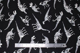 Flat swatch glow in the dark dinos without labels fabric (black fabric with tossed white dinosaur skeletons that glow in the dark)
