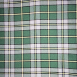 Swatch of Cape Breton tartan, featuring black outlined white bands and yellow fine stripes on a green background