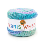 A cake of Lion Brand Ferris Wheel in colourway Cotton Candy (twisted strands of pastel shades of pink, green, turquoise, and indigo)