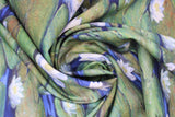 Swirled swatch waterlilies fabric (collaged green lily pads and white waterlilies on dark blue water)