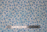Flat swatch anchor toss fabric (neutral fabric with tossed blue anchors allover)