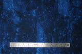 Flat swatch birds indigo fabric (dark blues marbled look fabric with subtle light blue bird silhouettes allover)