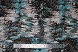 Flat swatch teal trees fabric (white, brown and teal distressed look fabric displaying collaged tree shapes allover)