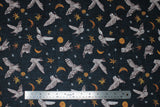Flat swatch navy owls fabric (dark navy fabric with tossed drawn style white/grey barn owls in various poses/flight stages and tossed white and orange stars in various sizes, tossed orange crescent and full moons)