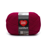 A ball of Red Heart Comfort in colourway Cardinal Red 