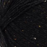 Swatch of Red Heart Comfort (Shimmer) in black fleck (black yarn with multi-coloured flecks and metallic sheen)