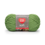 Ball of Red Heart soft yarn in guacamole (pale medium green)