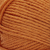 Red Heart soft yarn swatch in tangerine (medium pale orange)