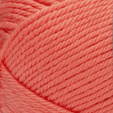 Red Heart soft yarn swatch in shade coral