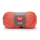 Ball of Red Heart soft yarn in coral
