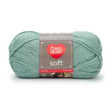 Ball of Red Heart soft yarn in seafoam (light pale blue/green)