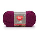 Ball of Red Heart soft yarn in berry (medium/dark purple shade)