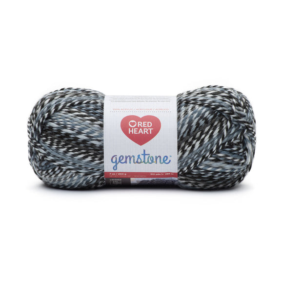 Ball of Red Heart Gemstone yarn in shade onyx (white/dark neutral twists: greys/black colourway)
