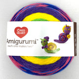Amigurumi 4 colour yarn wheel (snails) green and purple for bodies, yellow and multi for shells